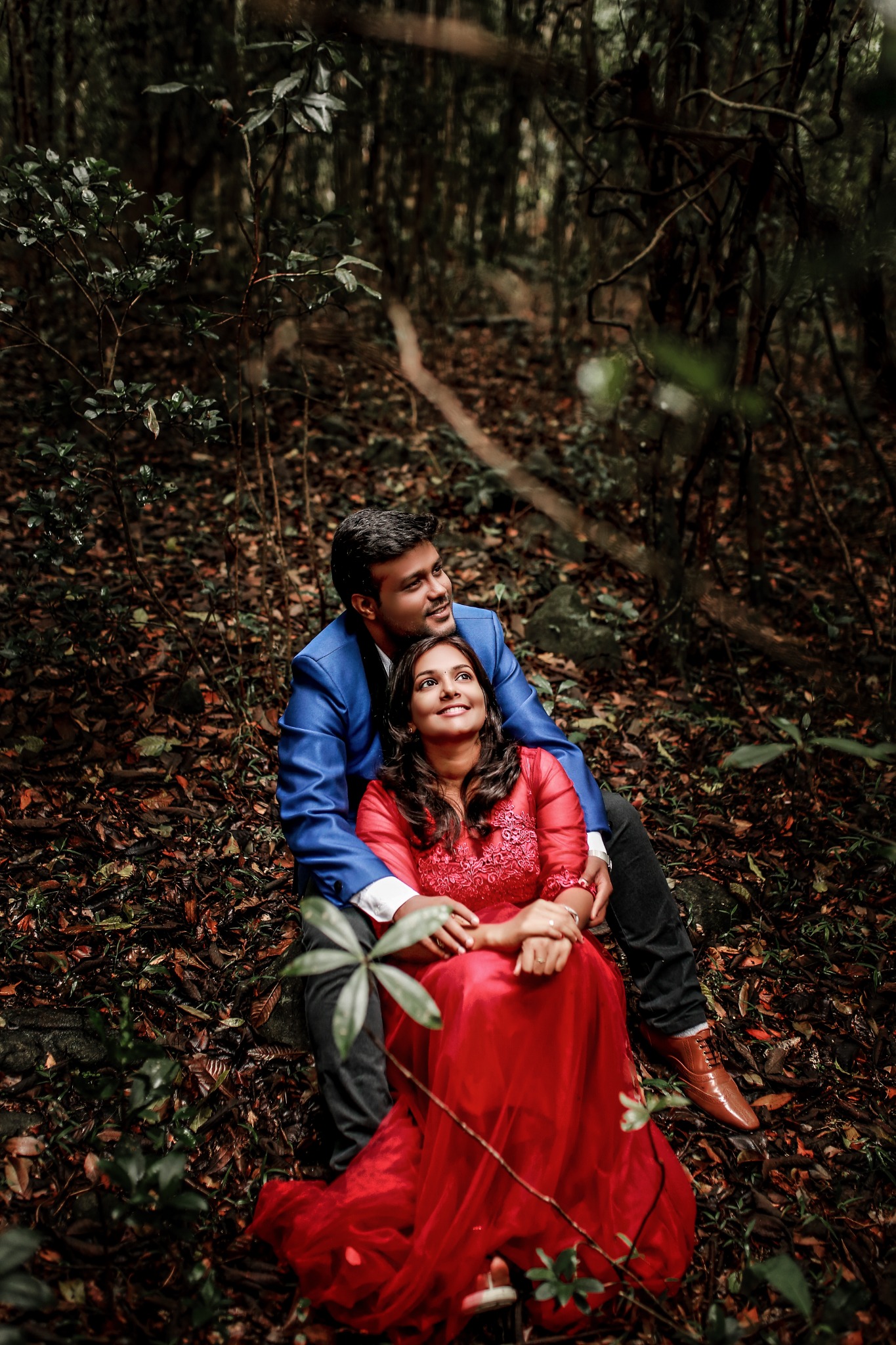 Couple portrait in a forest setting